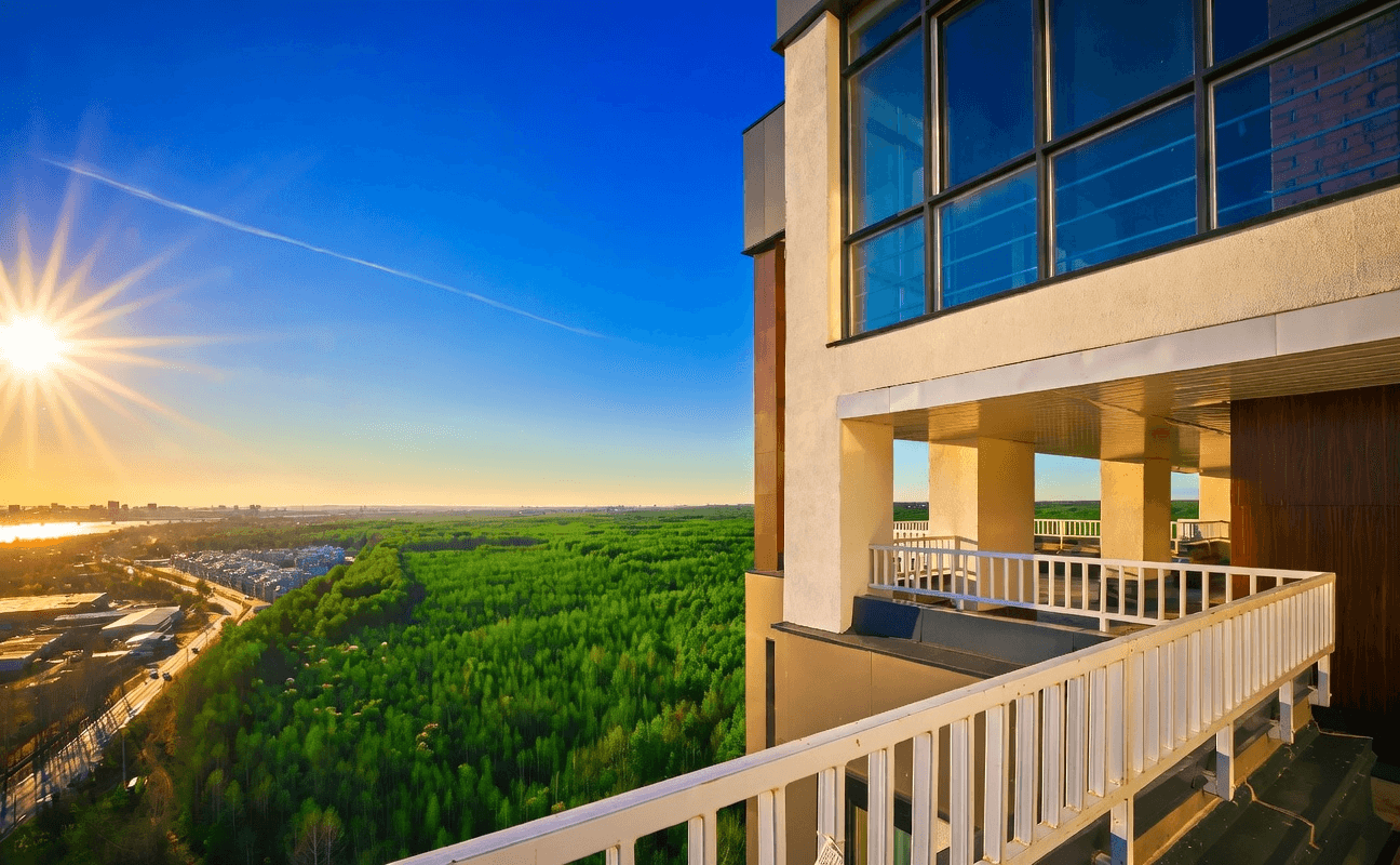 Grand stone building with glowing windows under a deep blue twilight. Dramatic lighting casts a mysterious, elegant ambiance. Surrounded by shadowy trees.